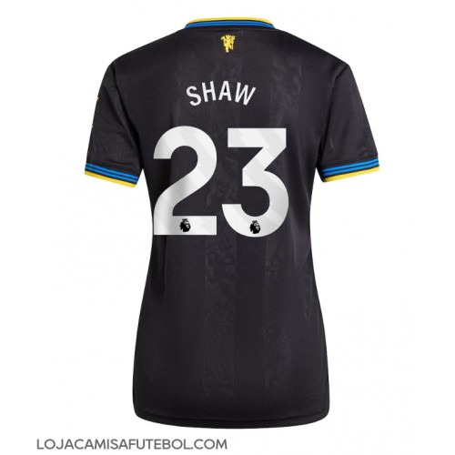 Camisa de Futebol Manchester United Luke Shaw #23 Equipamento Alternativo Mulheres 2025-26 Manga Curta Camisa de Futebol Manchester United Luke Shaw #23 Equipamento Alternativo Mulheres 2025-26 Manga Curta